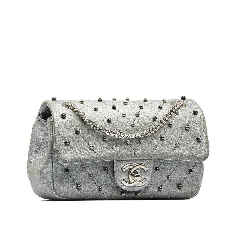 Chanel CC Chevron Studded Leather Flap Bag Leather Shoulder Bag in Good condition