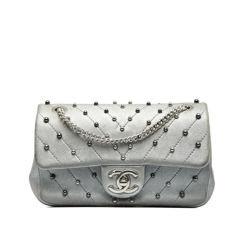 Chanel CC Chevron Studded Leather Flap Bag Leather Shoulder Bag in Good condition
