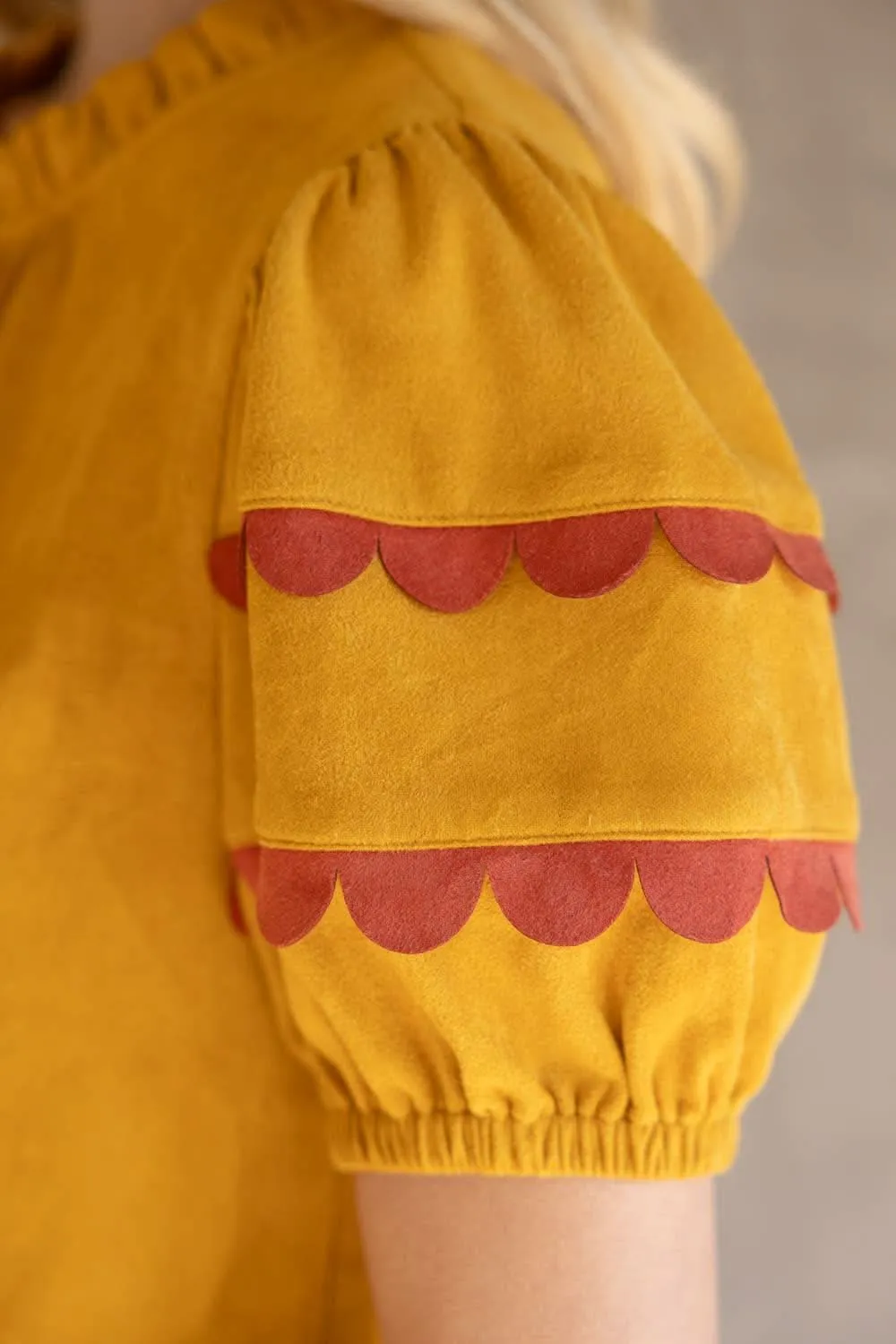 Mustard Scalloped and Smocked Suede Ruffle Top